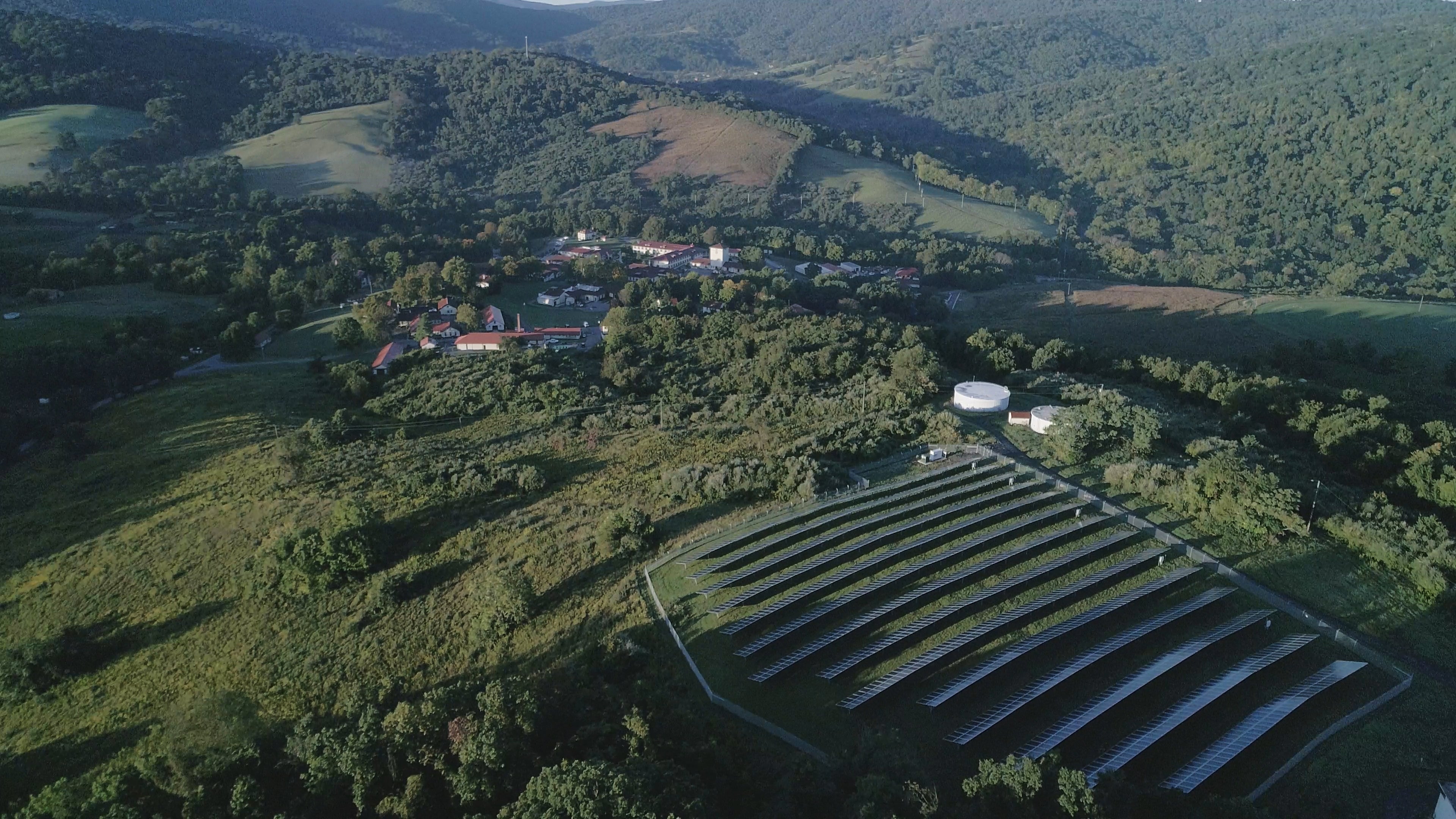 an aerial photo of a large solar panel array at the Smithsonian Conservation Biology Institute