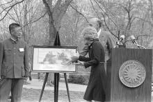 First Lady Patricia Nixon at the Zoo on April 20, 1972, for the official welcome ceremony for giant pandas Ling-Ling and Hsing-Hsing, a gift from China to the American people. The panda pair first arrived at the Zoo on Sunday, April 16, 1972. Photo courtesy of the Richard Nixon Presidential Library First Lady Patricia Nixon stands near a podium and looks at a photo of giant pandas April 20, 1972, for the official welcome ceremony for giant pandas Ling Ling and Hsing Hsing