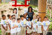 Sept. 25, 2015. First Lady of the U.S. Michelle Obama hosted First Lady of the People's Republic of China Peng Liyuan at the Zoo to commemorate over four decades of scientific collaboration between the U.S. and China around giant panda conservation. They selected the name "Bei Bei" for the giant panda cub born at the Zoo Aug. 22, 2015. Third-grade students from the Washington Yu Ying Public Charter School assisted the First Ladies by unfurling the scrolls to reveal the cub's name. US First Lady Michelle Obama and Chinese First Lady Peng Liyuan pose with a group of school children after naming giant panda Bei Bei